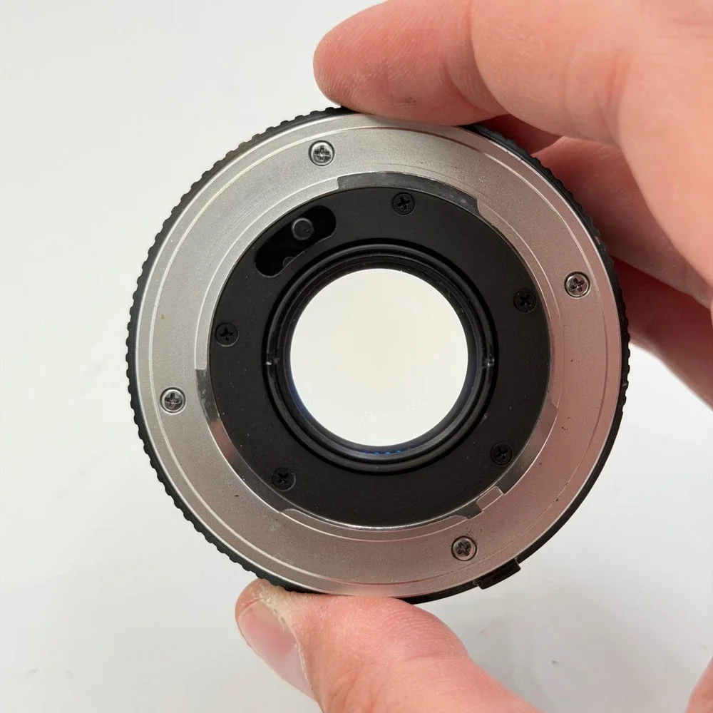 Minolta MC Rokkor-PF 50mm f/2 Lens with 55mm Skylight 1A Hood SR Mount 1126884